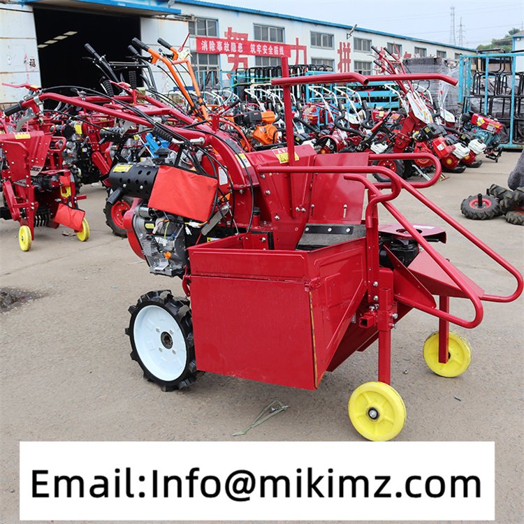 corn harvester hand working tractor